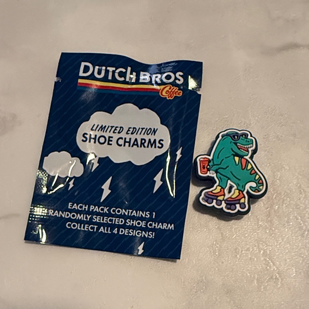 Dutch Bros Green Dino Roller Shoe Charm April 2026 croc charm drop
